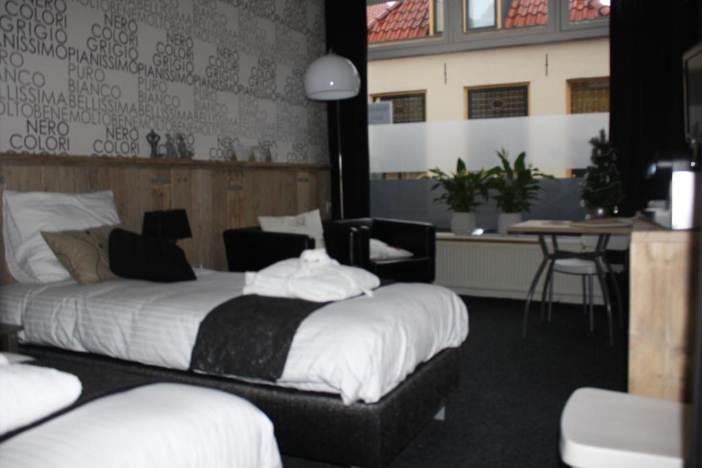 Bed & Breakfast Onder De Dekens Bed & Breakfast ฮาร์เดอร์วิก ห้อง รูปภาพ