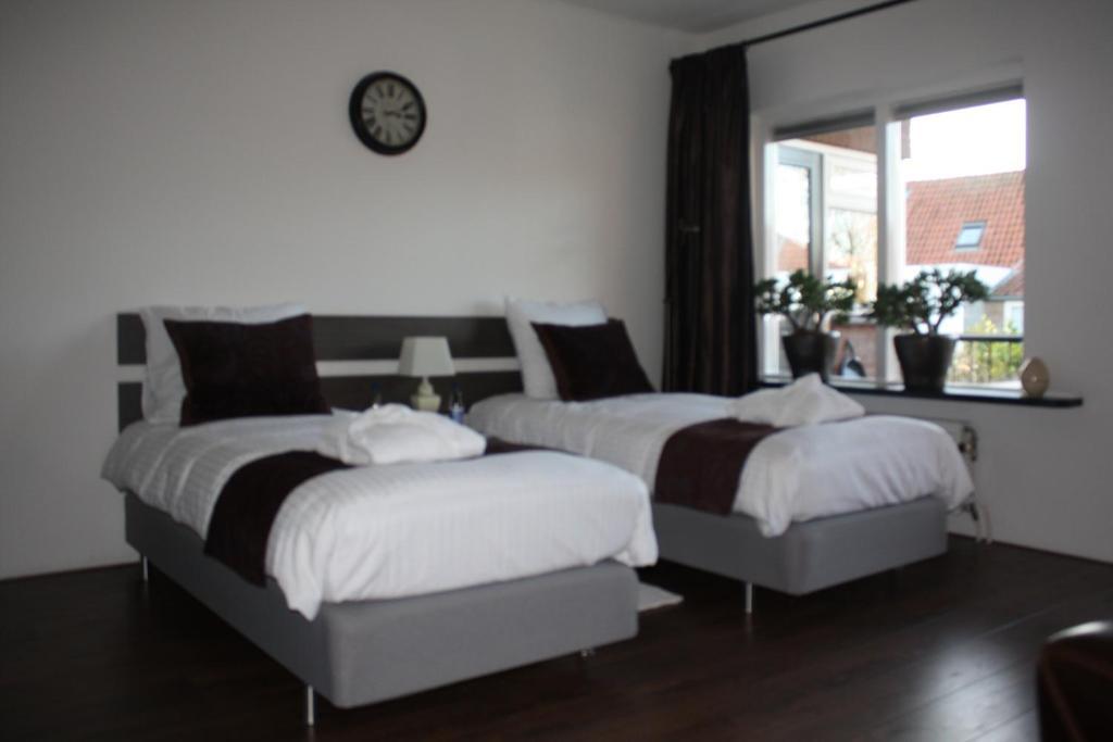 Bed & Breakfast Onder De Dekens Bed & Breakfast ฮาร์เดอร์วิก ห้อง รูปภาพ