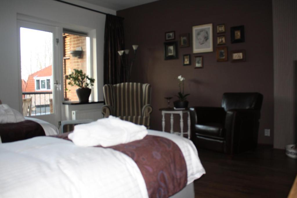 Bed & Breakfast Onder De Dekens Bed & Breakfast ฮาร์เดอร์วิก ห้อง รูปภาพ